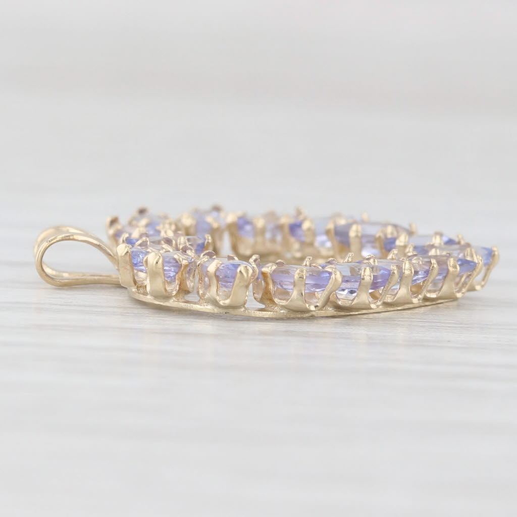 1.25ctw Tanzanite Open Heart Pendant 14k Yellow Gold