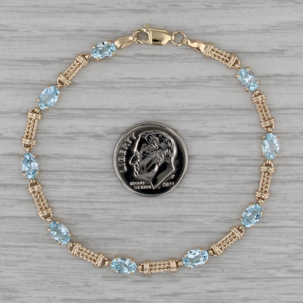 5.10ctw Blue Topaz Tennis Bracelet 10k Yellow Gold 7" 4.3mm