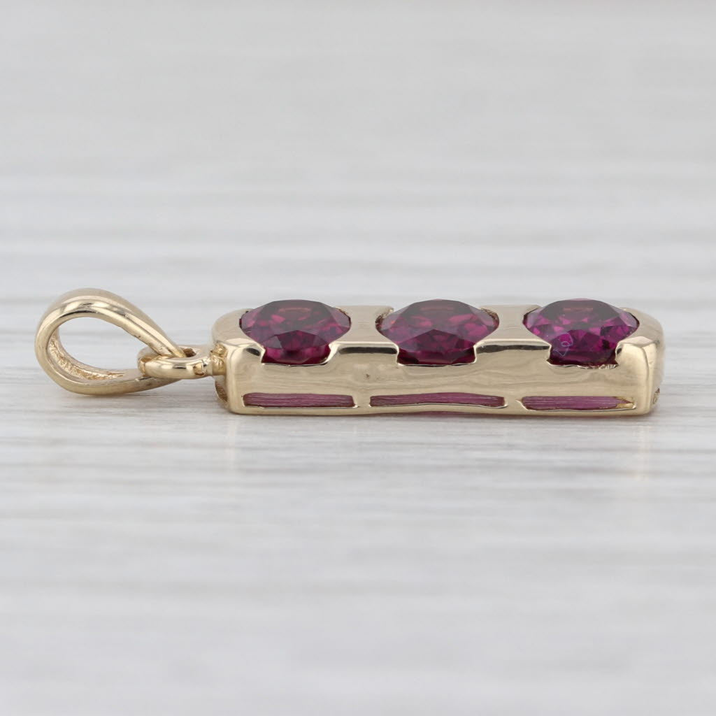 3ctw Rhodolite Garnet 3-Stone Pendant 10k Yellow Gold