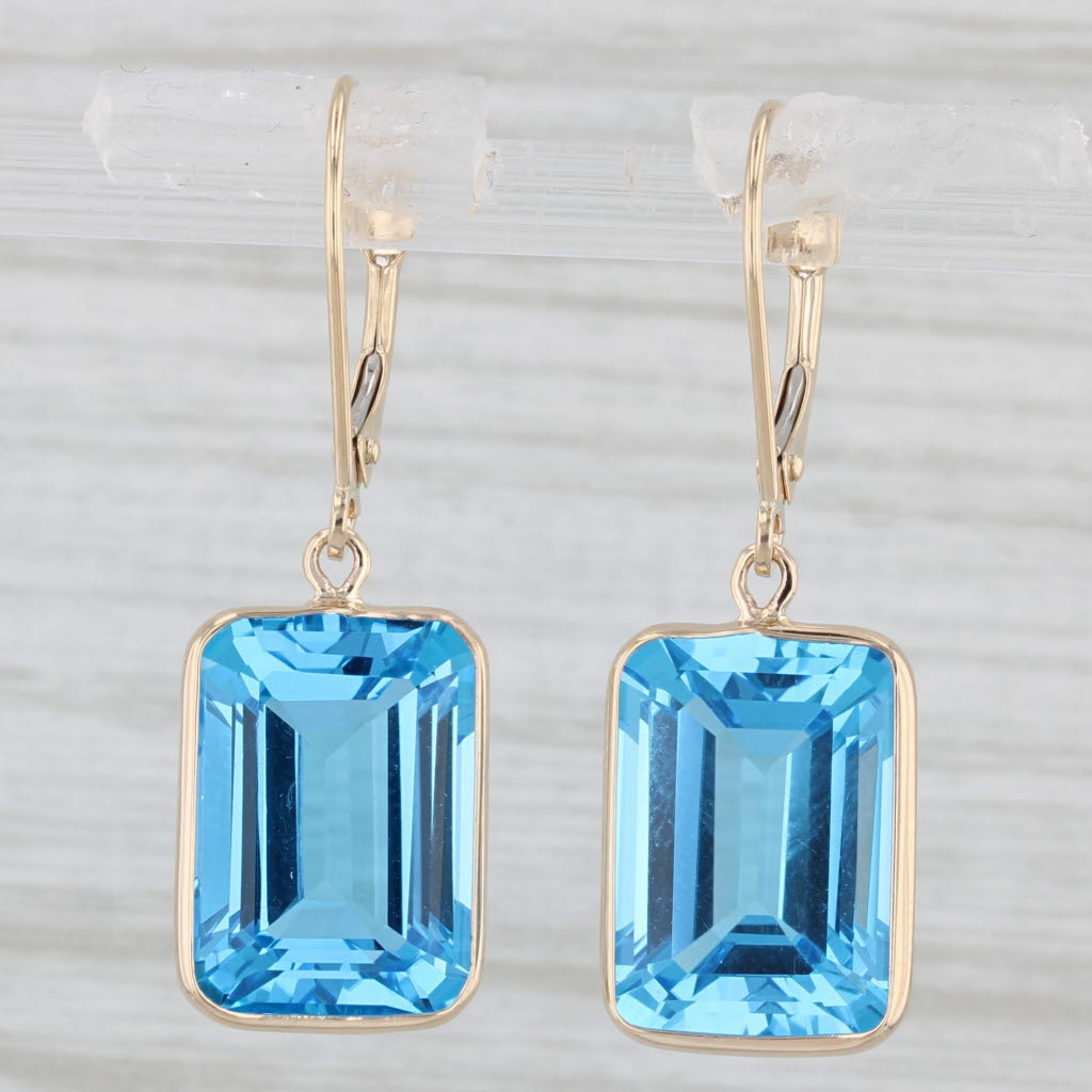 Light Gray 25ctw Blue Topaz Dangle Earrings 14k Yellow Gold Emerald Cut Drops