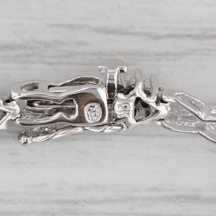 Gray 0.13ctw Diamond Cluster X Link Bracelet 10k White Gold 7" 5mm