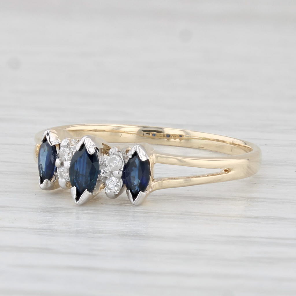 Light Gray 0.37ctw Marquise Blue Sapphire Diamond Ring 10k Yellow Gold Diamond Accents