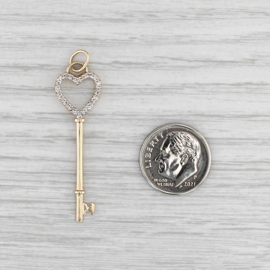 0.10ctw Diamond Heart Skeleton Key Pendant 14k Yellow Gold Charm