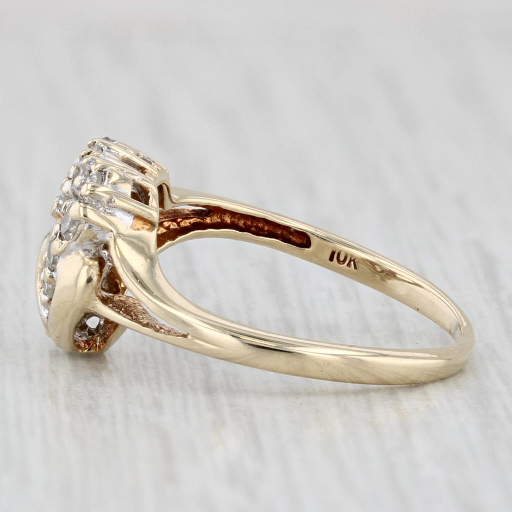 Light Gray 0.15ctw Diamond Interlocking Hearts Ring 10k Yellow Gold Size 4.5