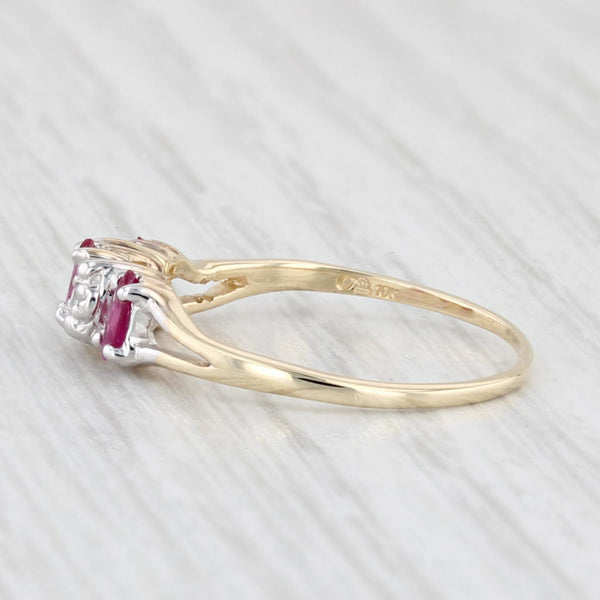 0.30ctw Marquise Ruby 3-Stone Ring 10k Yellow Gold Size 5.25 Diamond Accents