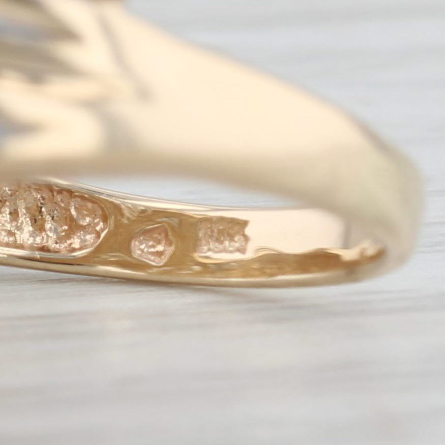 Light Gray 0.64ctw Diamond Knot Bypass Ring 10k Yellow Gold Size 7.25 Cocktail