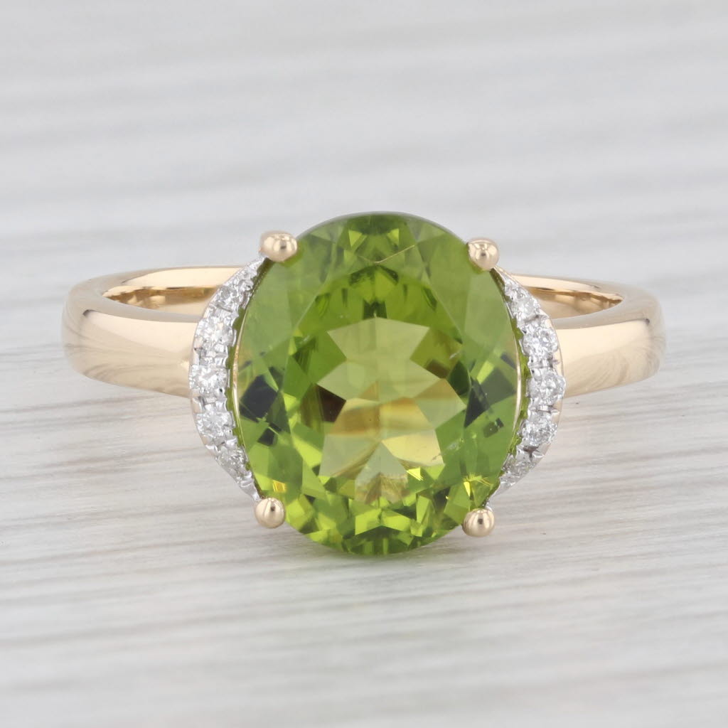 Light Gray 4.03ctw Oval Peridot Diamond Ring 14k Yellow Gold Size 7