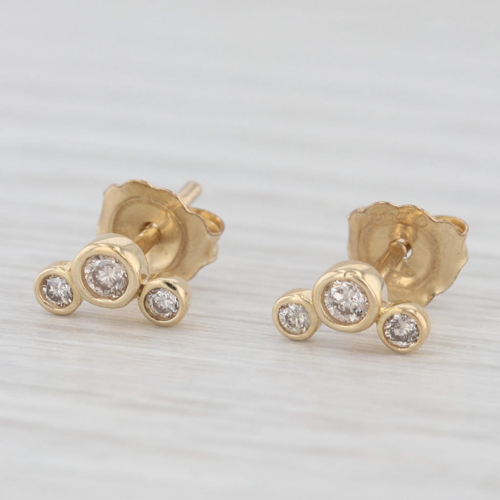 Light Gray New 0.15ctw Diamond 3-Stone Stud Earrings 10k Yellow Gold