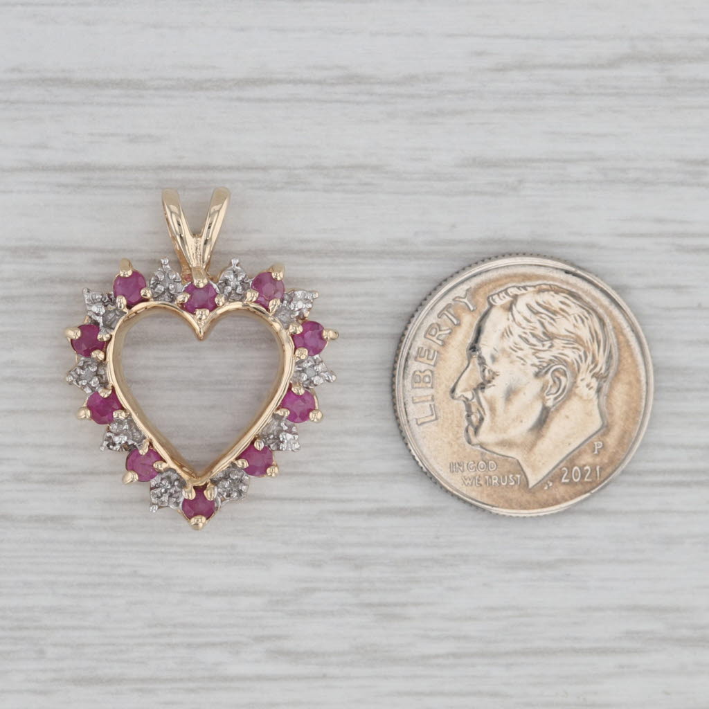 Gray 0.64ctw Diamond Ruby Open Heart Pendant 10k Yellow Gold