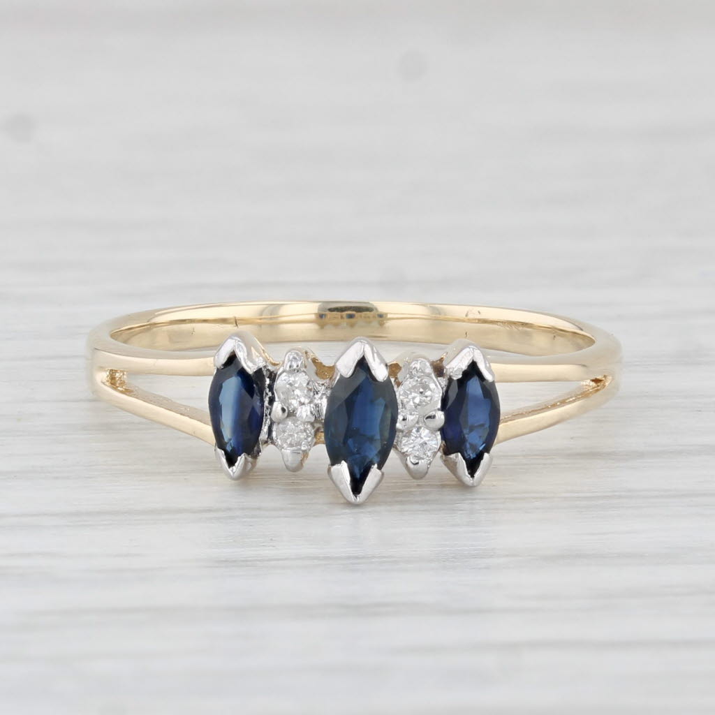 Light Gray 0.37ctw Marquise Blue Sapphire Diamond Ring 10k Yellow Gold Diamond Accents