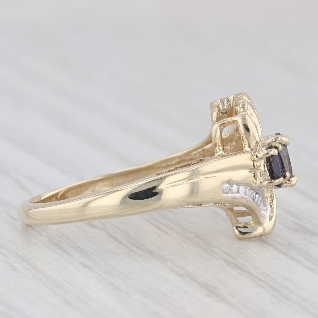 Light Gray 0.50ctw 3-Stone Iolite Bypass Ring 10k Yellow Gold Size 7.25
