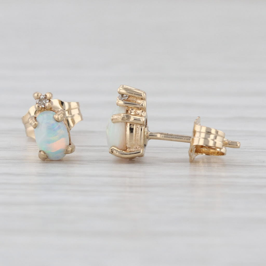 Oval Cabochon Opal Stud Earrings 10k Yellow Gold Diamond Accents