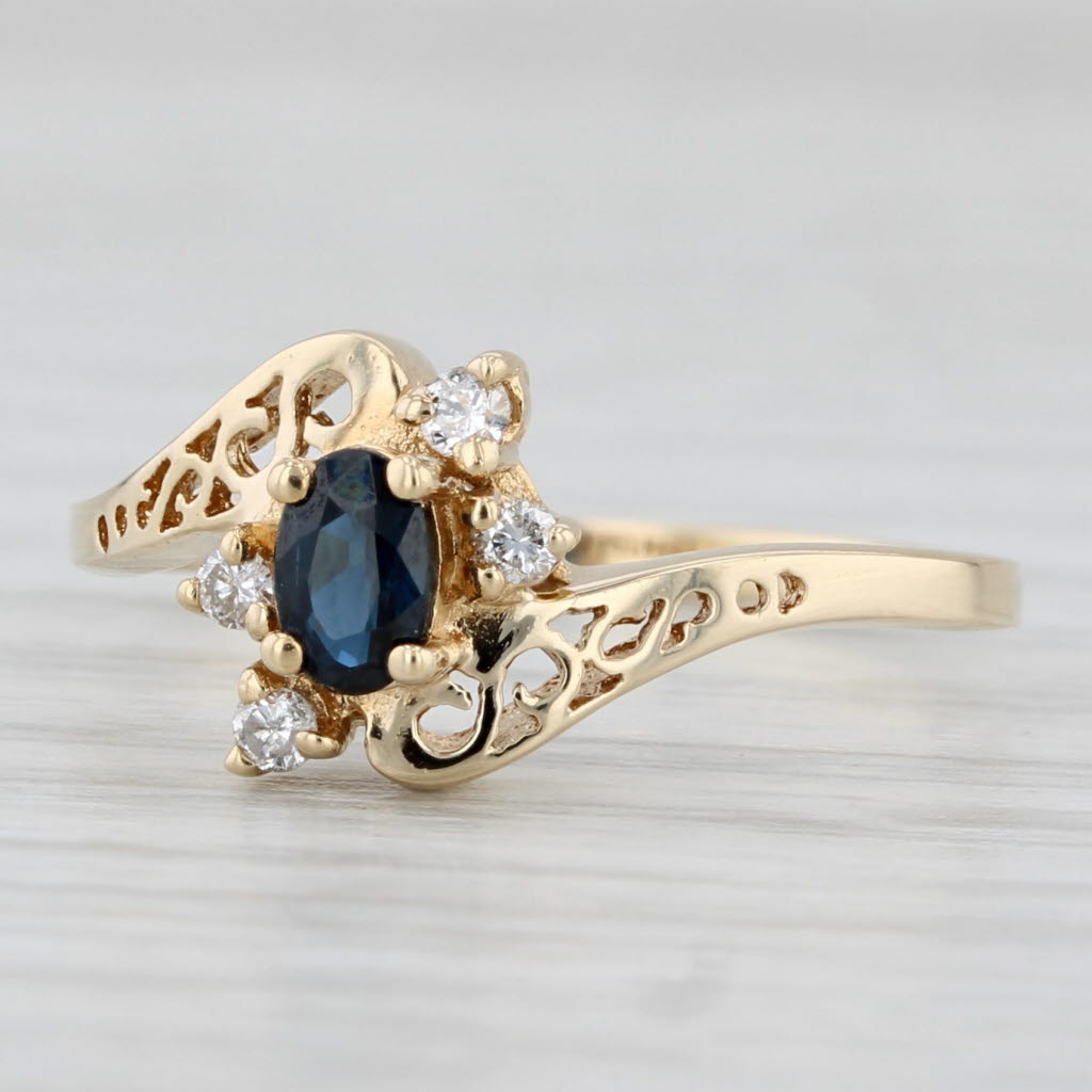 Light Gray 0.34ctw Blue Sapphire Diamond Bypass Ring 14k Yellow Gold Size 6.5