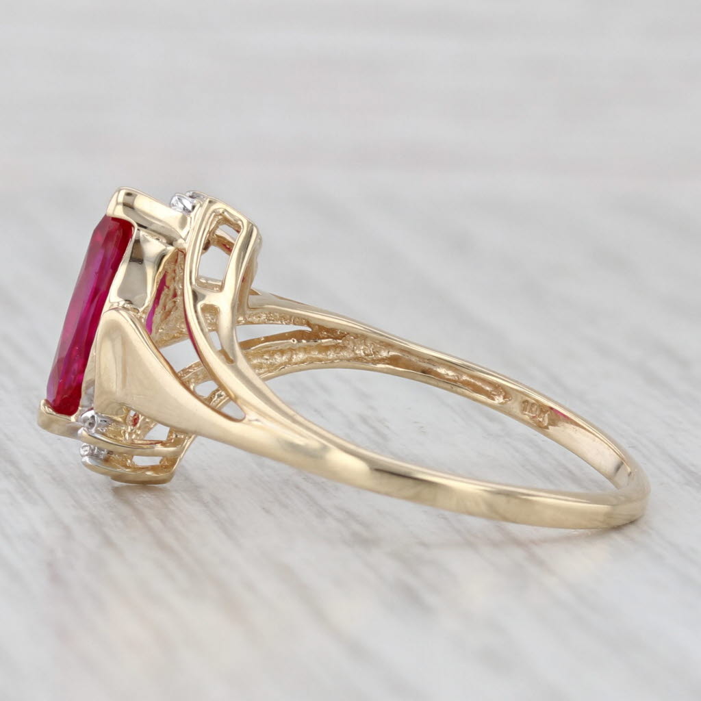 Light Gray 1.48ct Lab Created Ruby Ring 10k Yellow Gold Size 8.25 Bypass