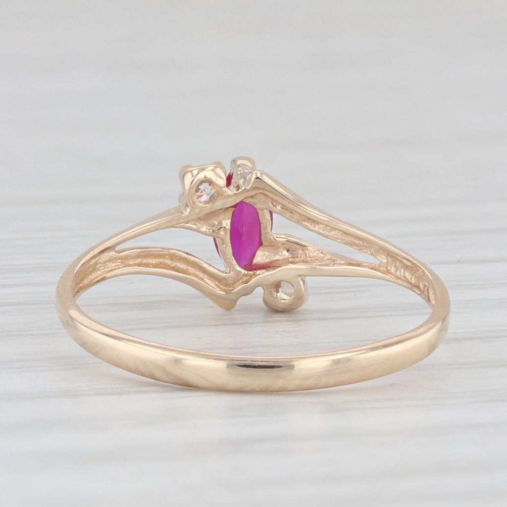 Light Gray 0.39ctw Lab Created Ruby Cubic Zirconia Ring 10k Yellow Gold Size 7 Bypass