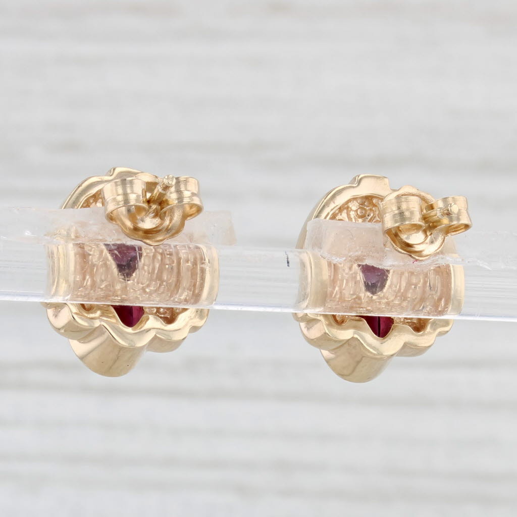 Light Gray 1.10ctw Garnet Stud Earrings 14k Yellow Gold Oval Solitaires