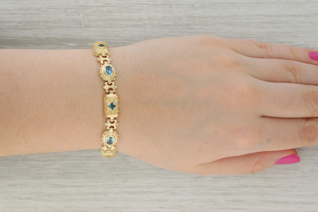 Tan 3ctw Blue Topaz Ornate Bracelet 14k Yellow Gold 7.25" 10.4mm