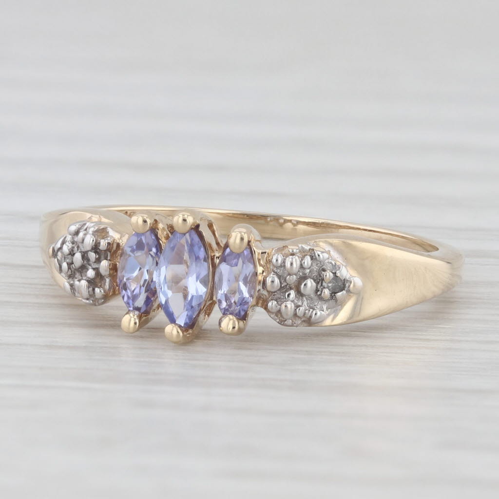Light Gray 0.25ctw Tanzanite 3-Stone Ring 10k Yellow Gold Size 7 Diamond Accents