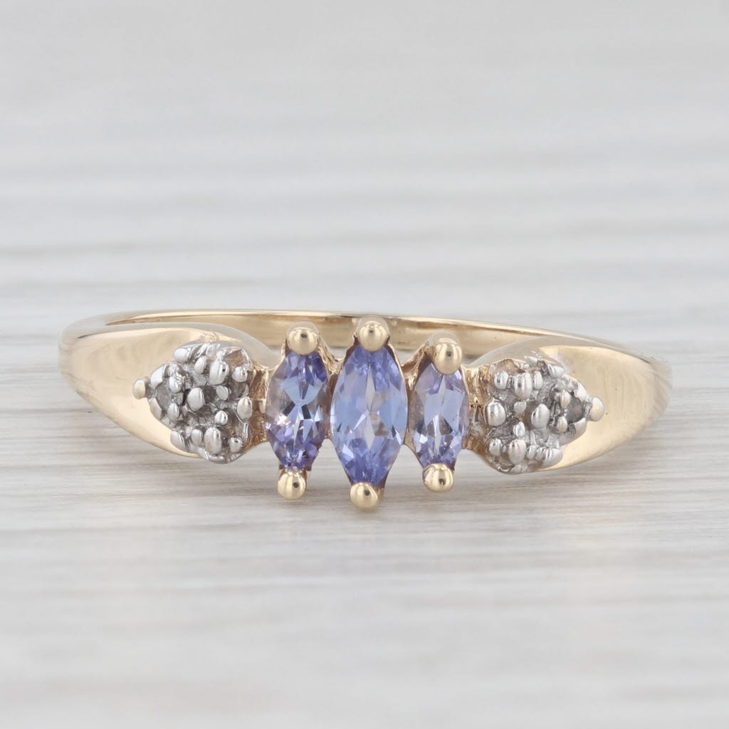 Light Gray 0.25ctw Tanzanite 3-Stone Ring 10k Yellow Gold Size 7 Diamond Accents