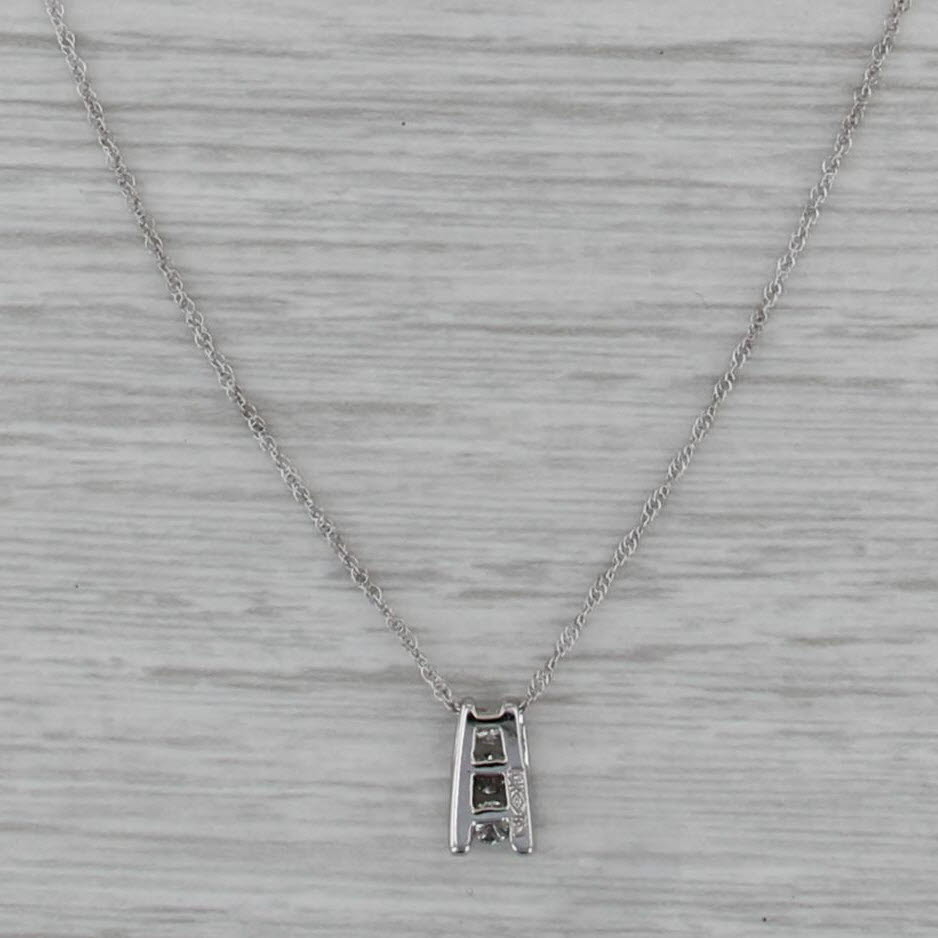 0.11ctw Diamond 3-Stone Journey Pendant Necklace 10k White Gold 18.5" Rope Chain