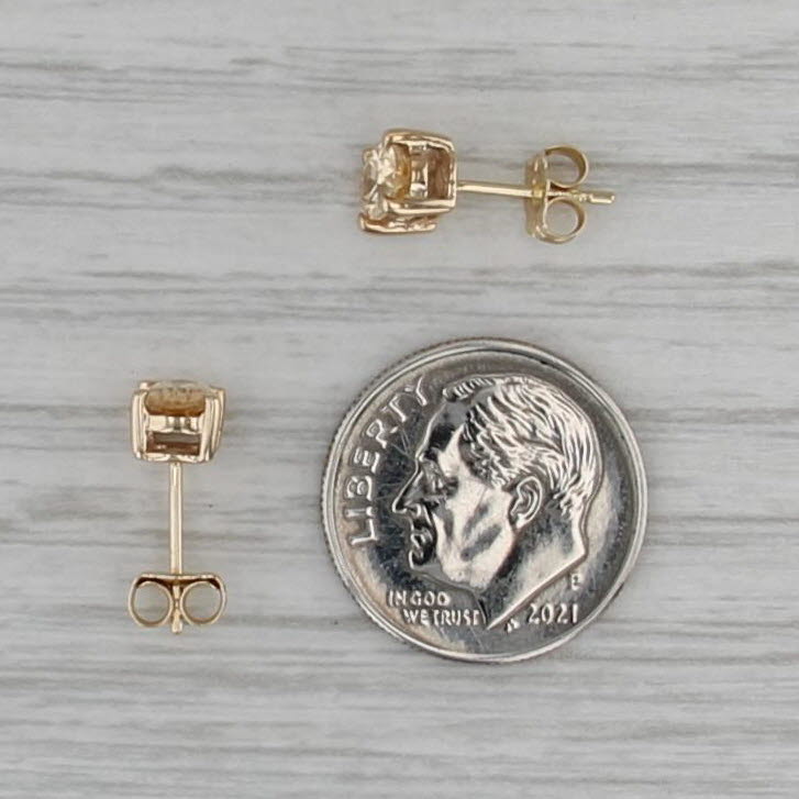 1.07ctw Yellow Topaz Stud Earrings 10k Yellow Gold Oval Solitaire Studs