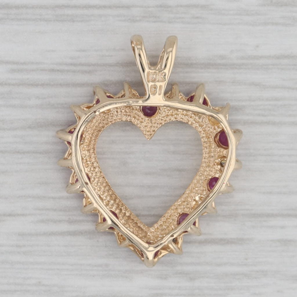 Gray 0.64ctw Diamond Ruby Open Heart Pendant 10k Yellow Gold