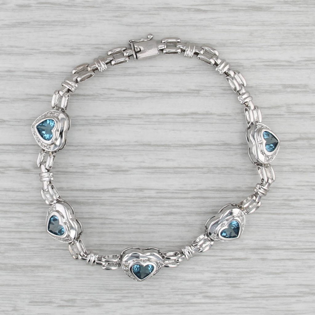 4.61ctw Blue Topaz Hearts Diamond Bracelet 14k White Gold 7"