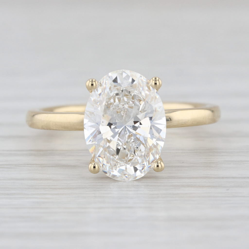 New IGI 3.09ctw Oval Halo Lab Grown Diamond Engagement Ring 14k Yellow Gold