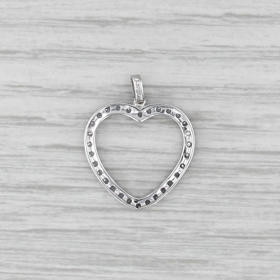 0.58ctw Tanzanite Open Heart Pendant 10k White Gold