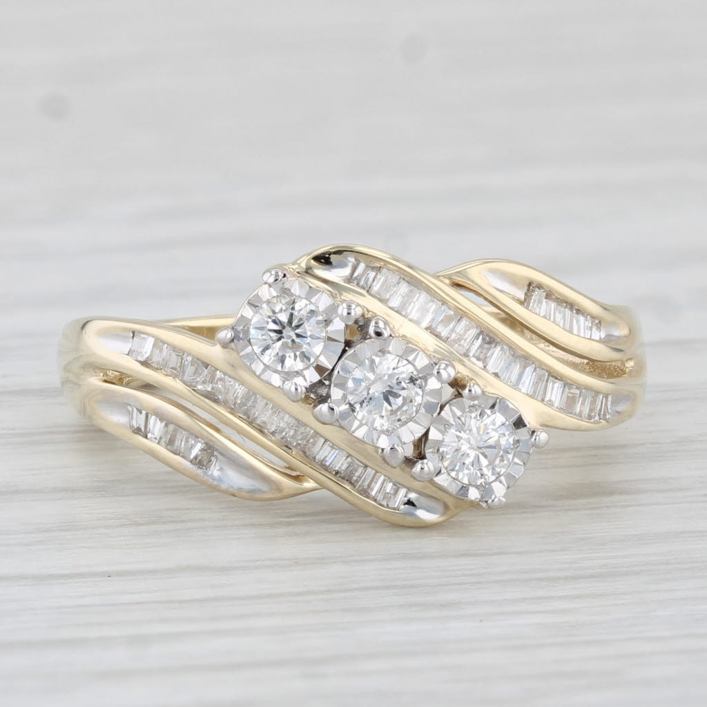 Light Gray 0.53ctw Round 3-Stone Diamond Bypass Ring 10k Yellow Gold Size 7