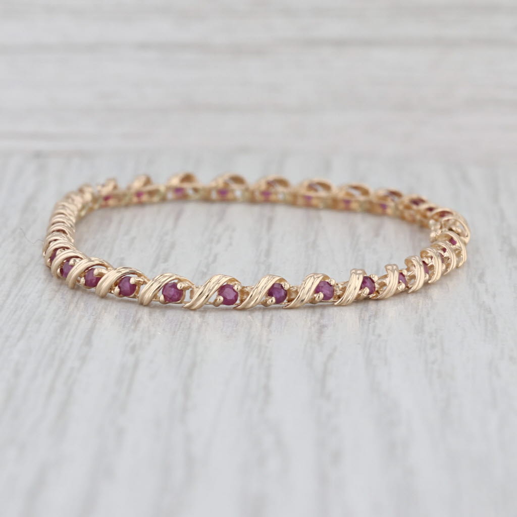 2.10ctw Ruby Tennis Bracelet 14k Yellow Gold 7" 4mm