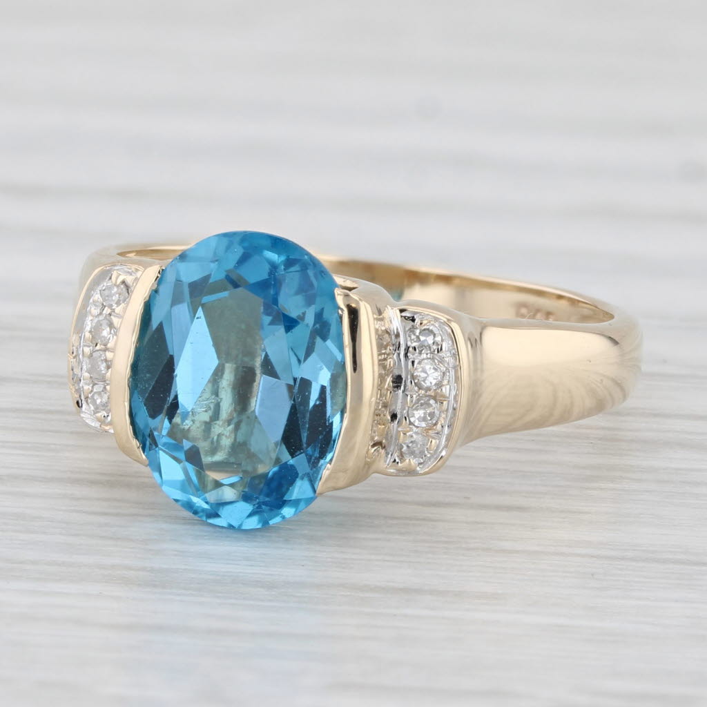 Light Gray 3.40ctw Oval Blue Topaz Diamond Ring 14k Yellow Gold Size 7.25