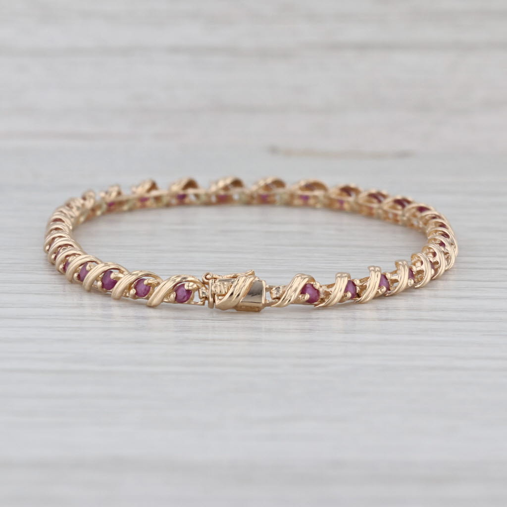 2.10ctw Ruby Tennis Bracelet 14k Yellow Gold 7" 4mm