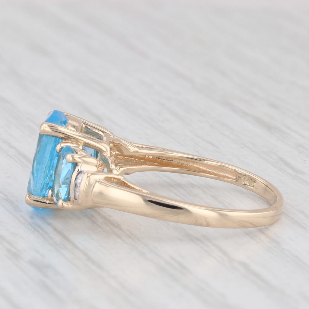 Light Gray 4.48ctw Oval Blue Topaz Ring 14k Yellow Gold Diamond Accents Size 7