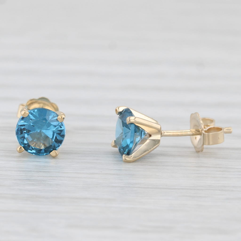 Light Gray 1.50ctw Lab Created Blue Spinel Stud Earrings 14k Yellow Gold