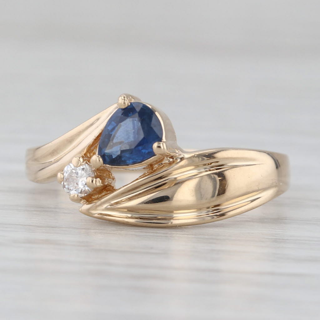 Light Gray 0.46ctw Pear Blue Diamond Bypass Ring 14k Yellow Gold Size 7.75