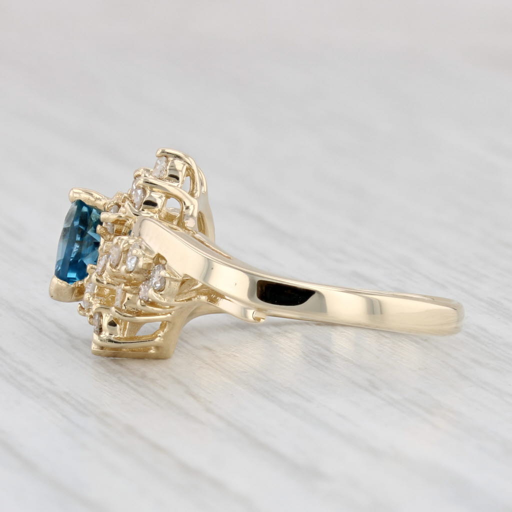 Light Gray 1.15ctw Pear Blue Topaz Diamond Ring 14k Yellow Gold Size 5.25
