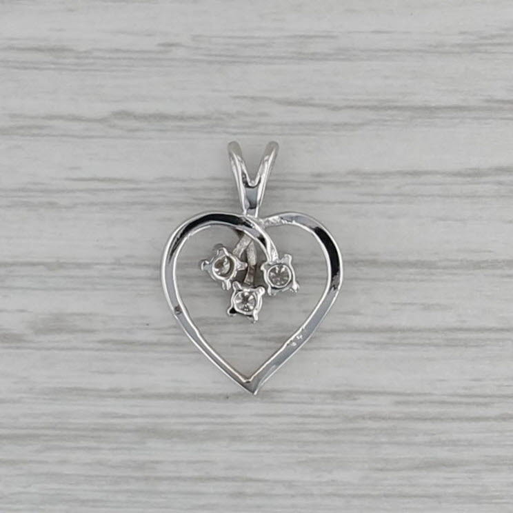 0.12ctw Diamond 3-Stone Open Heart Pendant 14k White Gold
