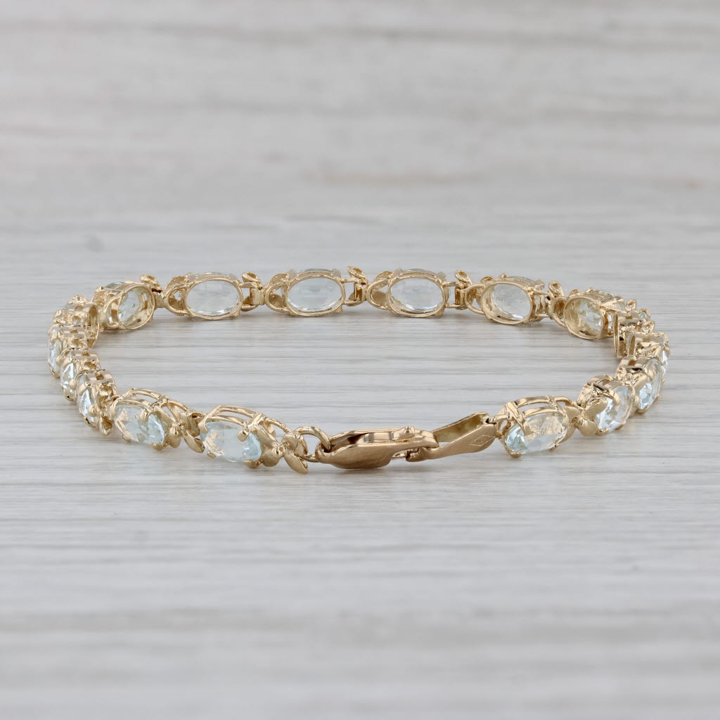 Gray 6.80ctw Oval Aquamarine Floral Tennis Bracelet 14k Yellow Gold 7" 4.2mm
