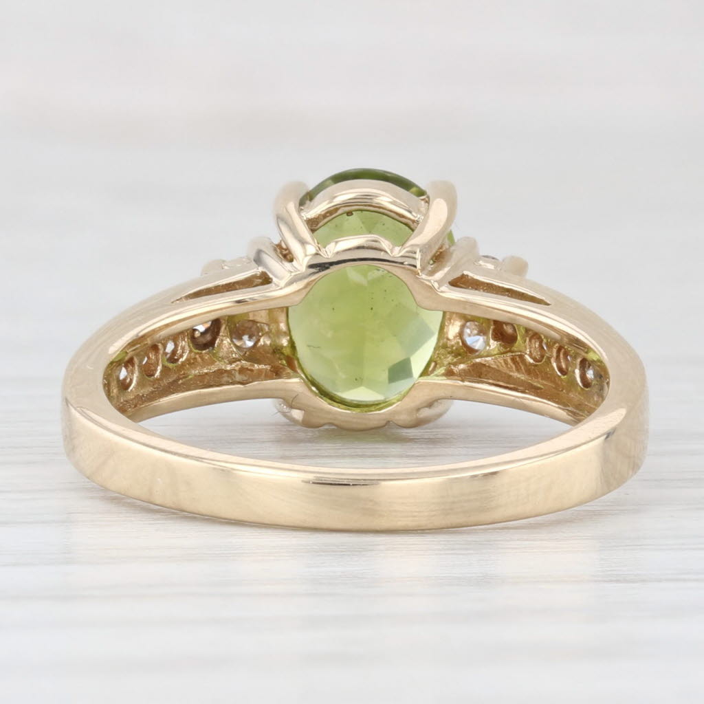Light Gray 2.20ctw Oval Green Peridot Diamond Ring 14k Yellow Gold Size 7