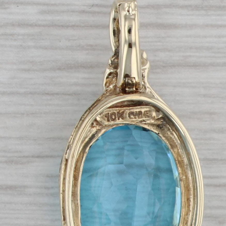 Gray 7.40ct Oval Blue Topaz Enhancer Pendant 10k Yellow Gold Clip Bail
