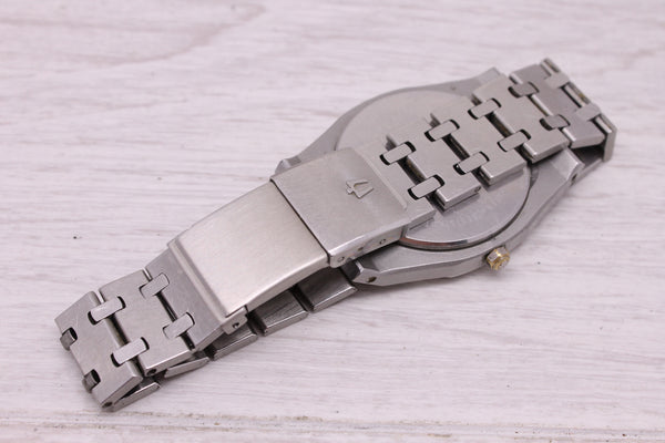 Vintage 1981 Bulova Royal Oak Mens 35mm Stainless Steel Quartz Watch Black Dial