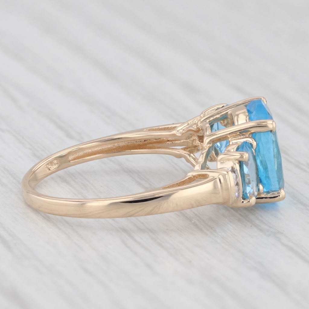 Light Gray 4.48ctw Oval Blue Topaz Ring 14k Yellow Gold Diamond Accents Size 7