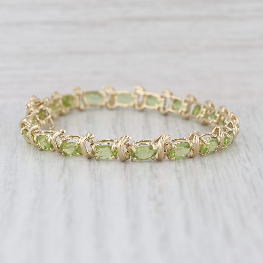 10ctw Light Green Peridot Tennis Bracelet 14k Yellow Gold 6.75" 6.4mm
