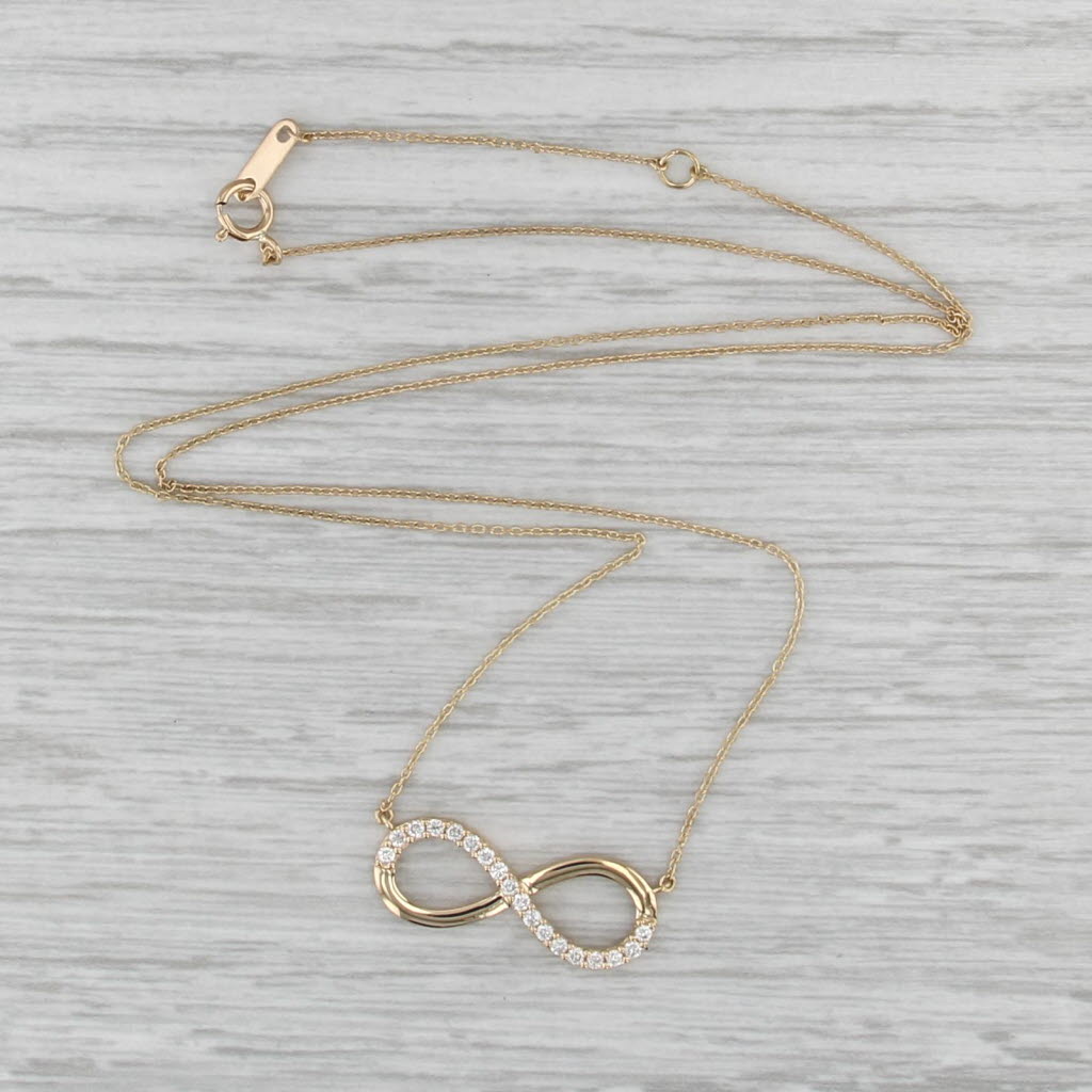 0.16ctw Diamond Infinity Knot Pendant Necklace 18k Yellow Gold 16.25-17.75"