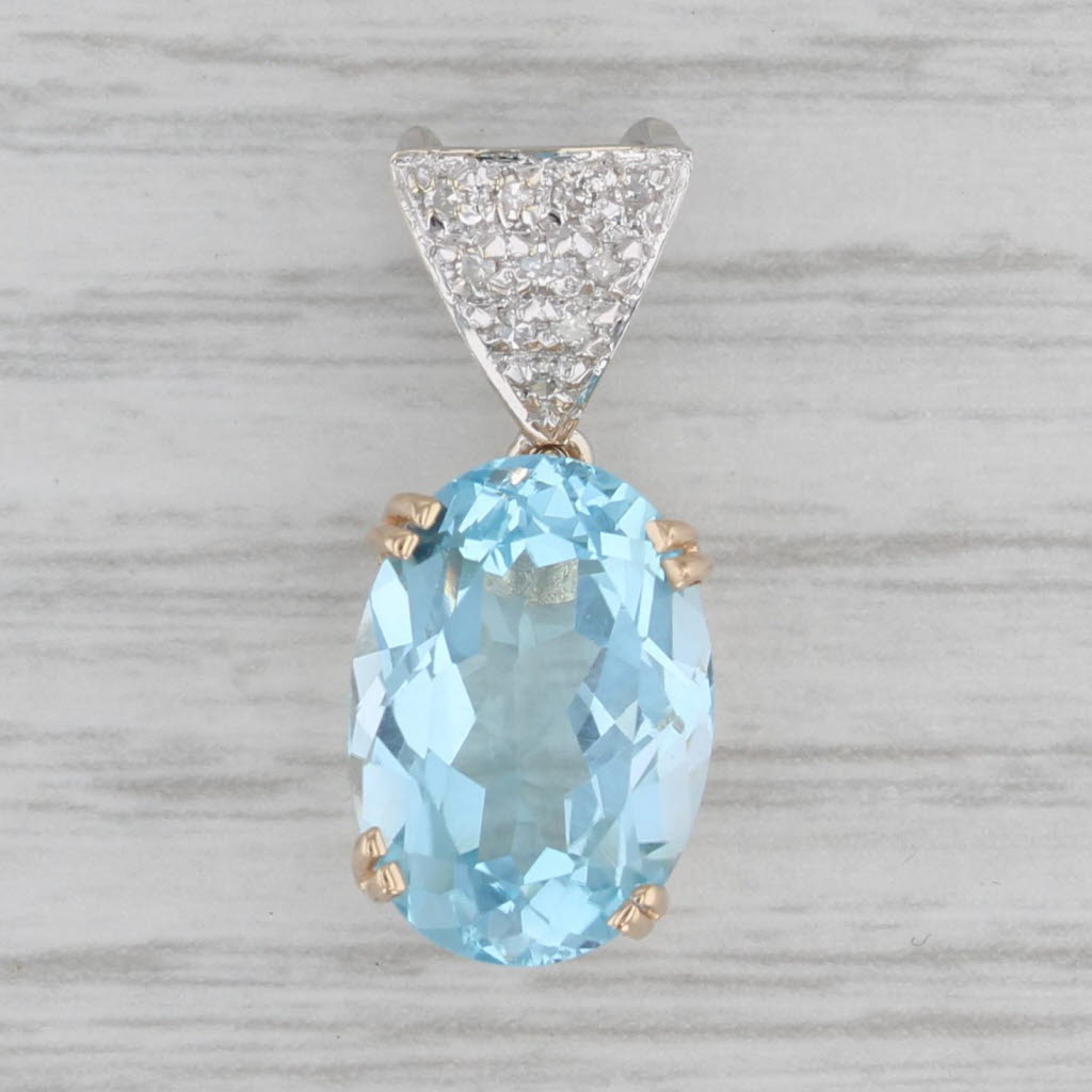 Gray 7.56 ctw Oval Blue Topaz Diamond 14K Yellow White Gold Pendant