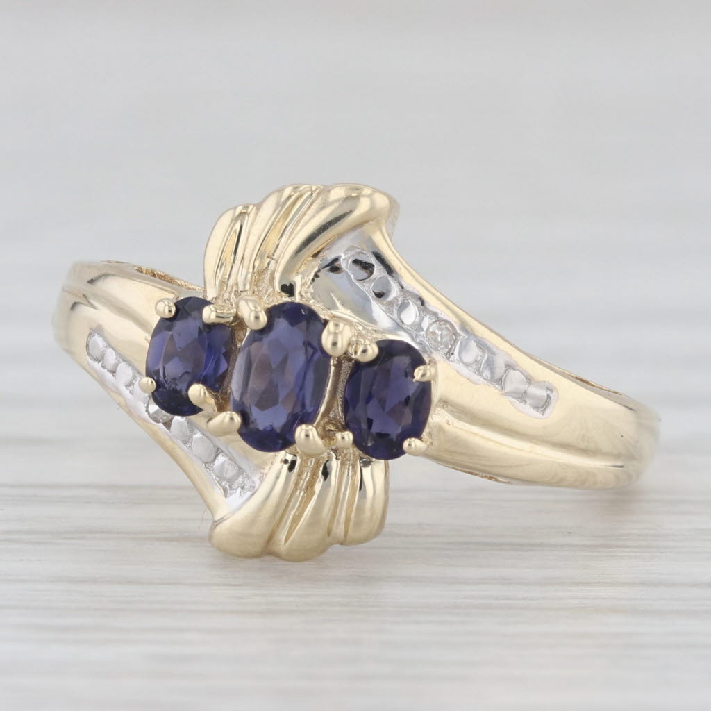 Light Gray 0.50ctw 3-Stone Iolite Bypass Ring 10k Yellow Gold Size 7.25