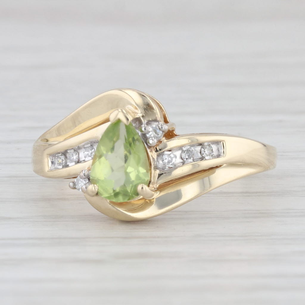 Light Gray 0.79ctw Pear Peridot Diamond Bypass Ring 10k Yellow Gold Size 7