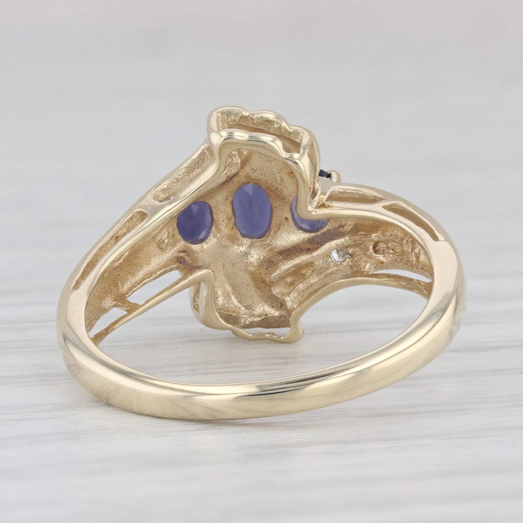 Light Gray 0.50ctw 3-Stone Iolite Bypass Ring 10k Yellow Gold Size 7.25