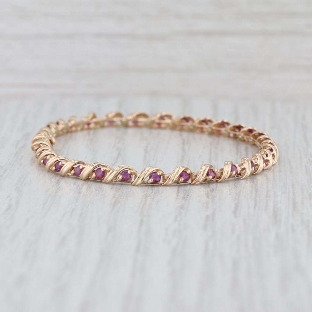 2.10ctw Ruby Tennis Bracelet 14k Yellow Gold 7" 4mm